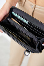 Resale The Travel Wallet in Black